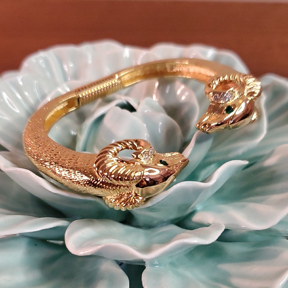 Goldtone Ram Head Bracelet signed KJL for Avon